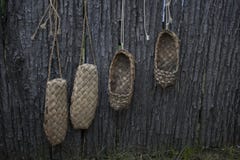 The old shoes hang on the fence and dried. Russian retro shoes. Shoes ancestors royalty free stock photos The old shoes hang on the fence and dried. Russian retro shoes. Shoes ancestors royalty free stock photos
