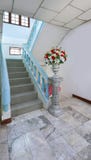 Old stairs and flower bouquet in an old house stock images Old stairs and flower bouquet in an old house stock images