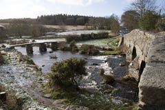 Old stone bridges at Postbridge a hamlet on Dartmoor UK royalty free stock photo Old stone bridges at Postbridge a hamlet on Dartmoor UK royalty free stock photo