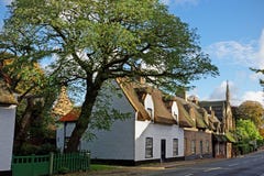 Old Thatched Cottages in a UK Town royalty free stock photo Old Thatched Cottages in a UK Town royalty free stock photo