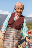 Old Tibetan woman selling jewellery