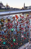 Old tradition of sealing a couple`s initial names inscribed padlock with the popular bridge and tossing the key into the river royalty free stock photo Old tradition of sealing a couple`s initial names inscribed padlock with the popular bridge and tossing the key into the river royalty free stock photo
