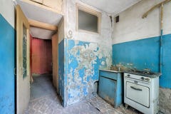 Old ugly abandoned empty kitchen in a residential building