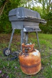 Old & very rusty propane canister and outdoor grill stock photos Old & very rusty propane canister and outdoor grill stock photos