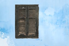 Old wooden window with black shutters. stock photography Old wooden window with black shutters. stock photography