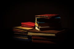 Old Worn Books On Black Royalty Free Stock Images