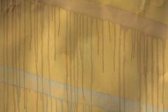 Old yellow metal sheet with blue and pink streaks of paint with smudges. rough surface texture royalty free stock photo Old yellow metal sheet with blue and pink streaks of paint with smudges. rough surface texture royalty free stock photo