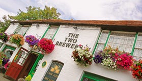 Oldest Country Pub In Kent With Summer Hanging Flower Baskets Royalty Free Stock Photography Oldest Country Pub In Kent With Summer Hanging Flower Baskets Royalty Free Stock Photography