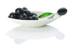 Olive On A Plate With Skewer Stock Image Olive On A Plate With Skewer Stock Image