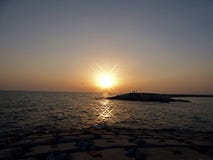 Oman Salalah, sikt av solnedgången på havet royaltyfri bild Oman Salalah, sikt av solnedgången på havet royaltyfri bild