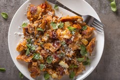 Omelette made from eggs, potatoes, sausages and grated cheese Royalty Free Stock Photography Omelette made from eggs, potatoes, sausages and grated cheese Royalty Free Stock Photography