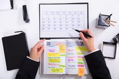 Onderneemster Marking Schedule royalty-vrije stock afbeelding Onderneemster Marking Schedule royalty-vrije stock afbeelding