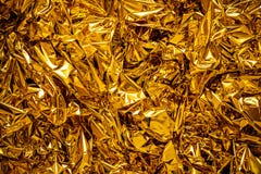 Onduidelijk beeldtextuur van het bladgoud, Gouden achtergrond royalty-vrije stock fotografie Onduidelijk beeldtextuur van het bladgoud, Gouden achtergrond royalty-vrije stock fotografie