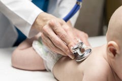 One caucasian female doctor is listening heartbeat of infant boy by stethoscope Stock Image One caucasian female doctor is listening heartbeat of infant boy by stethoscope Stock Image