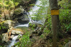 One of the Many Dangerous Waterfalls by the Crabtree Falls Trail stock image One of the Many Dangerous Waterfalls by the Crabtree Falls Trail stock image