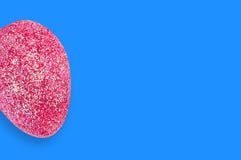 One red artificial eggs with sparkles on blue table. Copy space for your text. View from above. Happy Easter celebration royalty free stock photography One red artificial eggs with sparkles on blue table. Copy space for your text. View from above. Happy Easter celebration royalty free stock photography