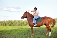 Op een paard stock foto Op een paard stock foto