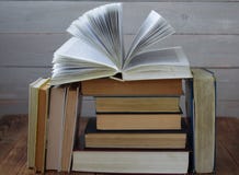 Open book on a pile of books royalty free stock images Open book on a pile of books royalty free stock images