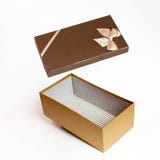 Open brown gift box on white background stock photo Open brown gift box on white background stock photo