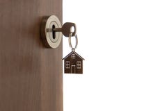 Open door to a new home. Key and home shaped keychain, isolated. Mortgage, investment, real estate, property and new home concept