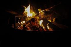 Open fire on campground black background royalty free stock photography Open fire on campground black background royalty free stock photography