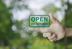 Open 24 hours icon on finger stock images Open 24 hours icon on finger stock images