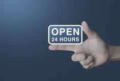 Open 24 hours icon on finger stock photos Open 24 hours icon on finger stock photos