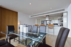 Open plan kitchen with dining area Stock Photo Open plan kitchen with dining area Stock Photo