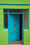 Open welcoming blue door Stock Image Open welcoming blue door Stock Image