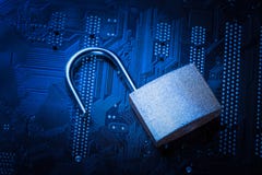 Opened padlock on computer motherboard. Internet data privacy information security concept. Blue toned image royalty free stock photos Opened padlock on computer motherboard. Internet data privacy information security concept. Blue toned image royalty free stock photos