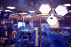 Operating room with working doctor`s team during surgical proced royalty free stock photo Operating room with working doctor`s team during surgical proced royalty free stock photo