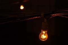 Orange lamp, lamp in a dark room, lamp in the basement, technical room royalty free stock photo Orange lamp, lamp in a dark room, lamp in the basement, technical room royalty free stock photo
