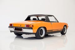 Orange Porsche 914 studio white stock images Orange Porsche 914 studio white stock images