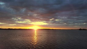 Orange sunset over a european lake, blue clouds sky Royalty Free Stock Images Orange sunset over a european lake, blue clouds sky Royalty Free Stock Images