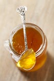 Orange thin cut marmalade or jam on a spoon Stock Image Orange thin cut marmalade or jam on a spoon Stock Image