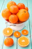 Oranges And Tangerines In Retro Colander. Stock Photography