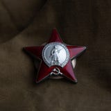 Order of the red star on the canvas. close-up. Symbols of the Great Patriotic War. May 9 stock images Order of the red star on the canvas. close-up. Symbols of the Great Patriotic War. May 9 stock images