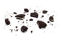Oreo Biscuits With Crumbs Isolated On White Background. It Is A Chocolate Sandwich Cookies Filled With Sweet Cream Flavored. Stock Images Oreo Biscuits With Crumbs Isolated On White Background. It Is A Chocolate Sandwich Cookies Filled With Sweet Cream Flavored. Stock Images