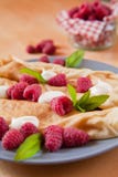 Organic home made Crepes with cream and raspberry stock photography Organic home made Crepes with cream and raspberry stock photography