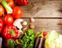 Organic Vegetables on a Wood Background