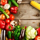 Organic Vegetables on a Wood Background