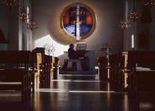 Organist playing in church.