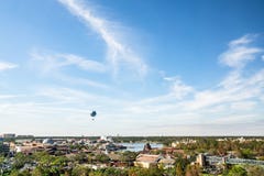Orlando, Florida - DEC, 2017 - Beautiful blue sky day with flying balloon background skyline view stock image Orlando, Florida - DEC, 2017 - Beautiful blue sky day with flying balloon background skyline view stock image