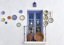 Ornaments hanging on a wall in the village of Frigiliana, typical streets of the Axarquia in Malaga. Spain