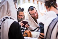 Orthodox Jewish men pray at western wall Stock Photo Orthodox Jewish men pray at western wall Stock Photo