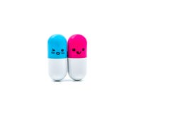 Os pares azuis e cor-de-rosa bonitos encerram os comprimidos isolados no branco ilustração do vetor Os pares azuis e cor-de-rosa bonitos encerram os comprimidos isolados no branco ilustração do vetor