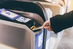 OSAKA , JAPAN - January 18, 2018 : Woman hand inserting Kansai t stock photo OSAKA , JAPAN - January 18, 2018 : Woman hand inserting Kansai t stock photo