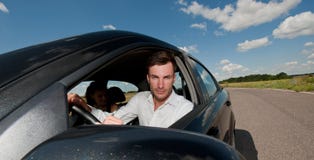 Oung Businessman In The Car Royalty Free Stock Photos