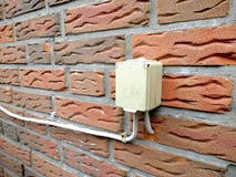 Outdoor electrical socket is mounted on the brick wall stock images Outdoor electrical socket is mounted on the brick wall stock images