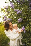 Mother and daughter in blossoming park royalty free stock photography Mother and daughter in blossoming park royalty free stock photography